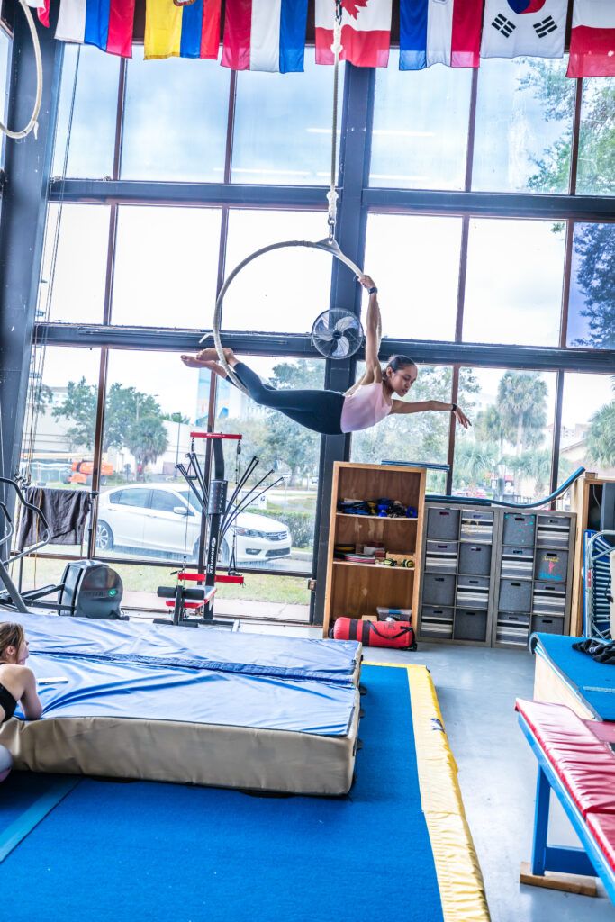 Child on the aerial hoop at Orlando Circus School