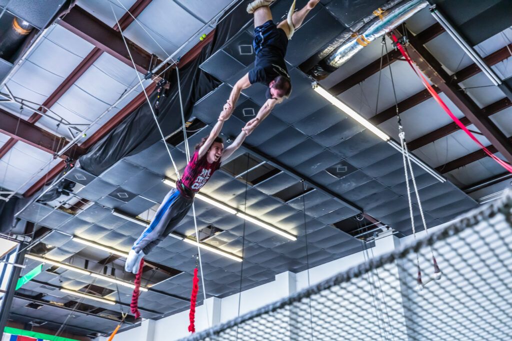 Young flyer on the flying trapeze at Orlando Circus School