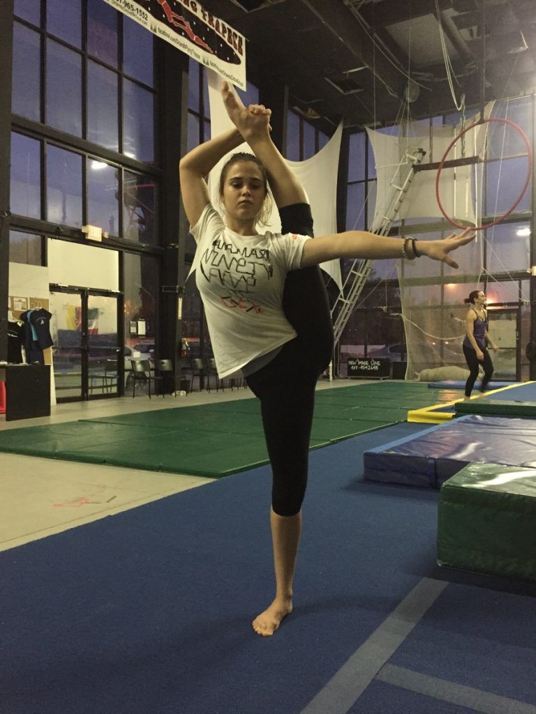 Adult student training aerial fitness in Orlando
